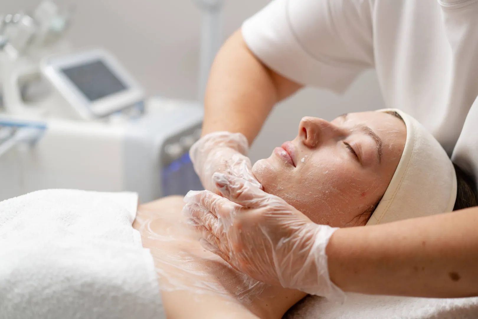 Facial treatment in a spa salon.